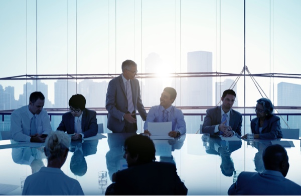 Group of employees in a meeting in a boardroom